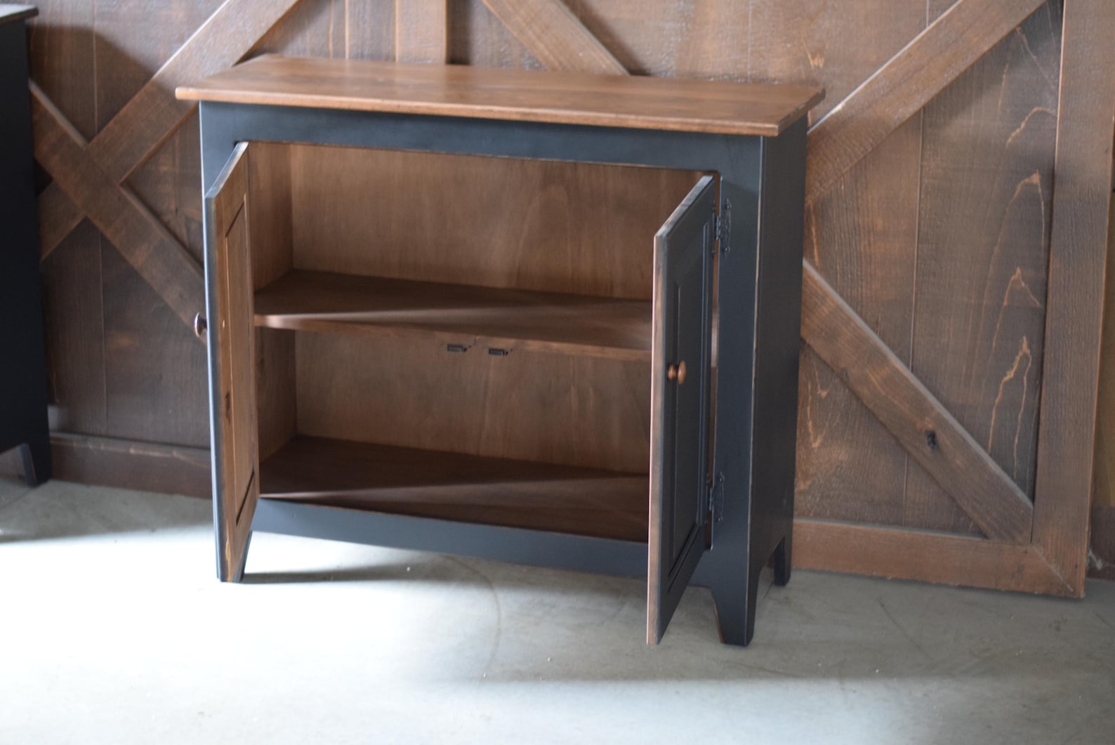 Open doors on primitive hall cabinet