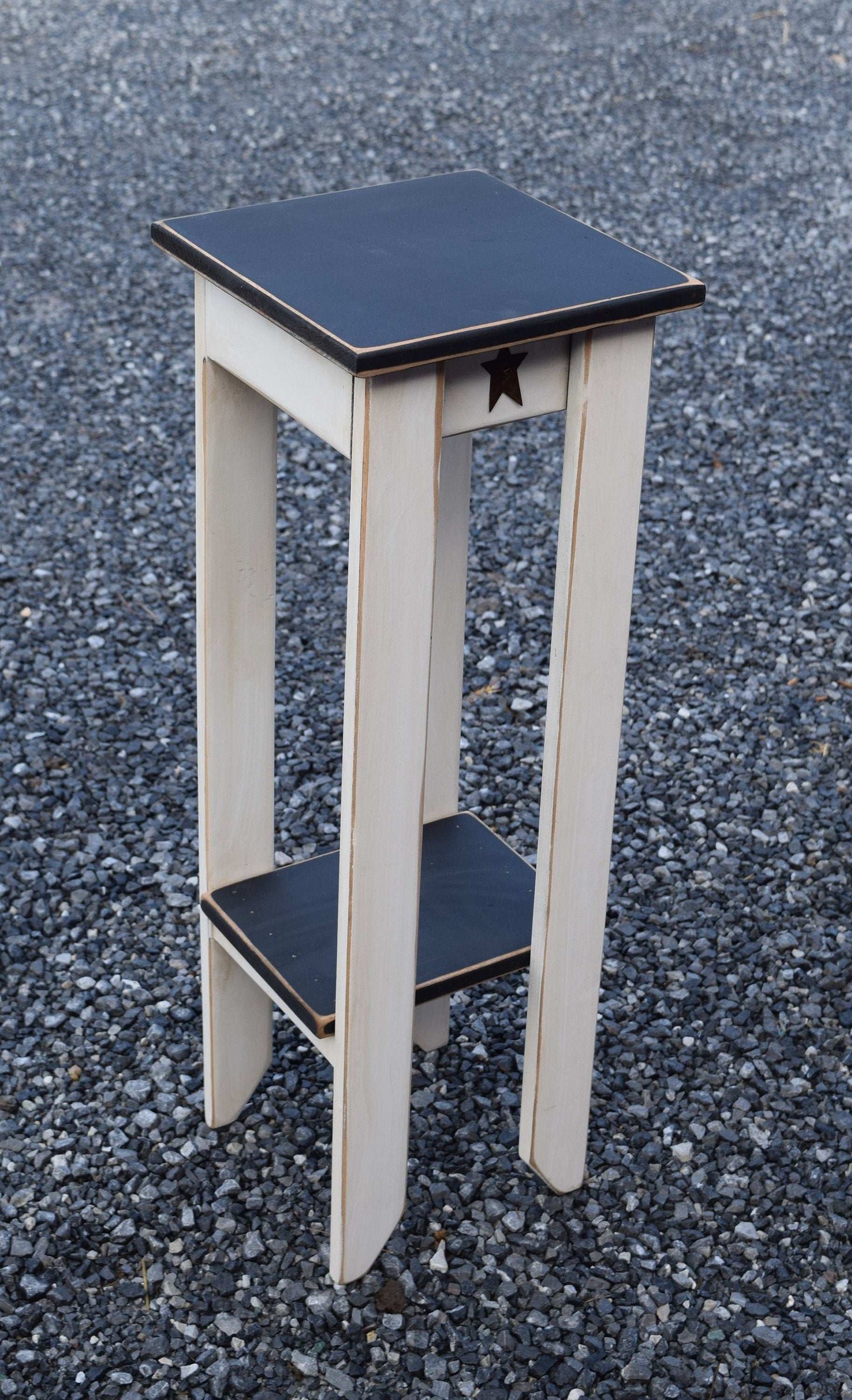 antique white and black accent table