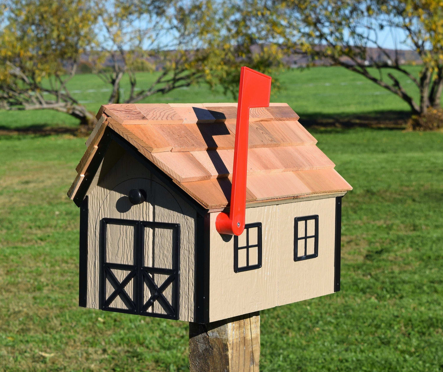 beige and black amish mailbox