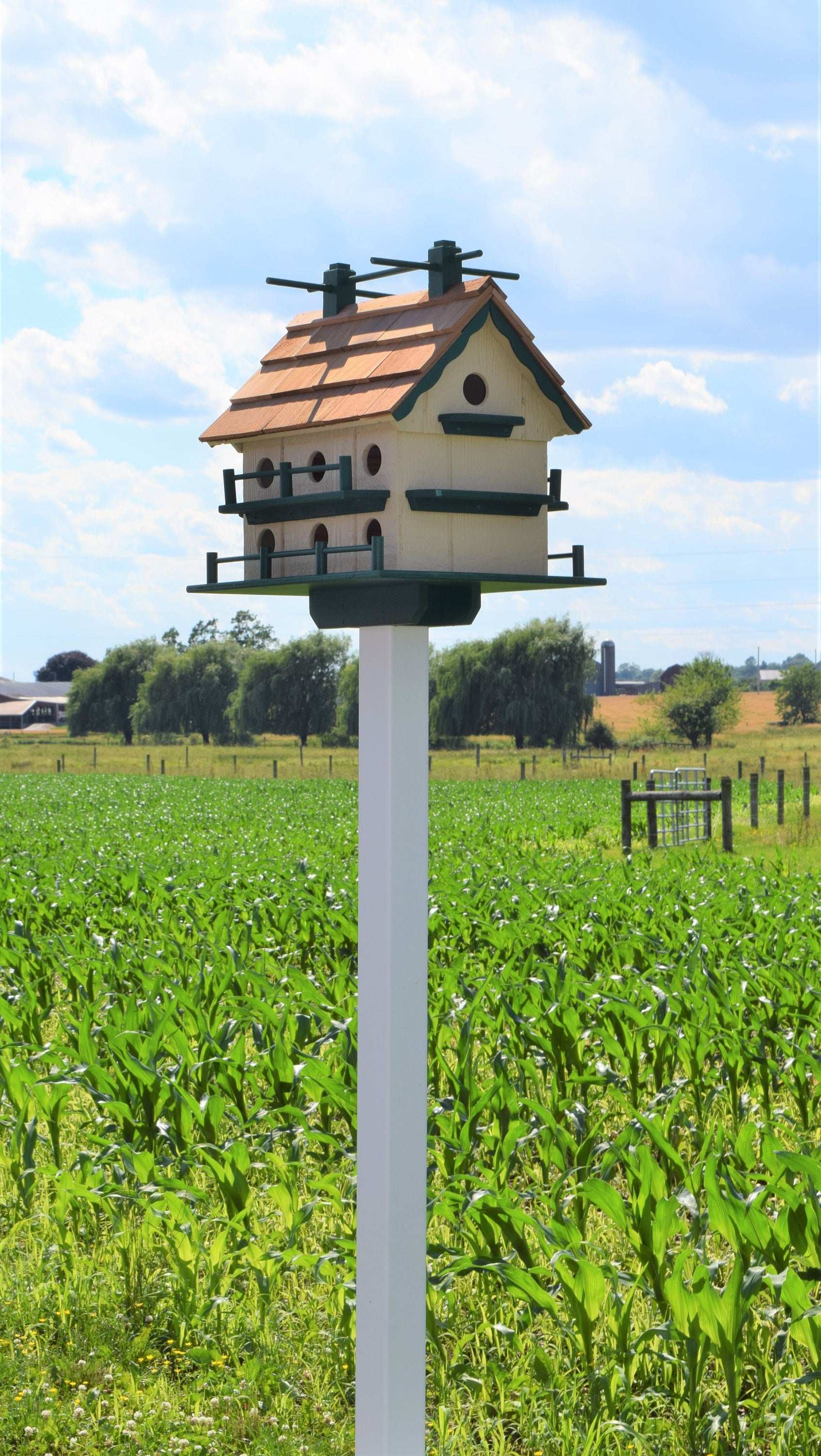 beige and green martin birdhouse