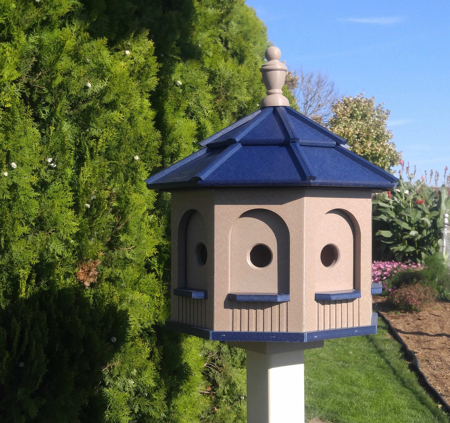 clay and blue poly birdhouse