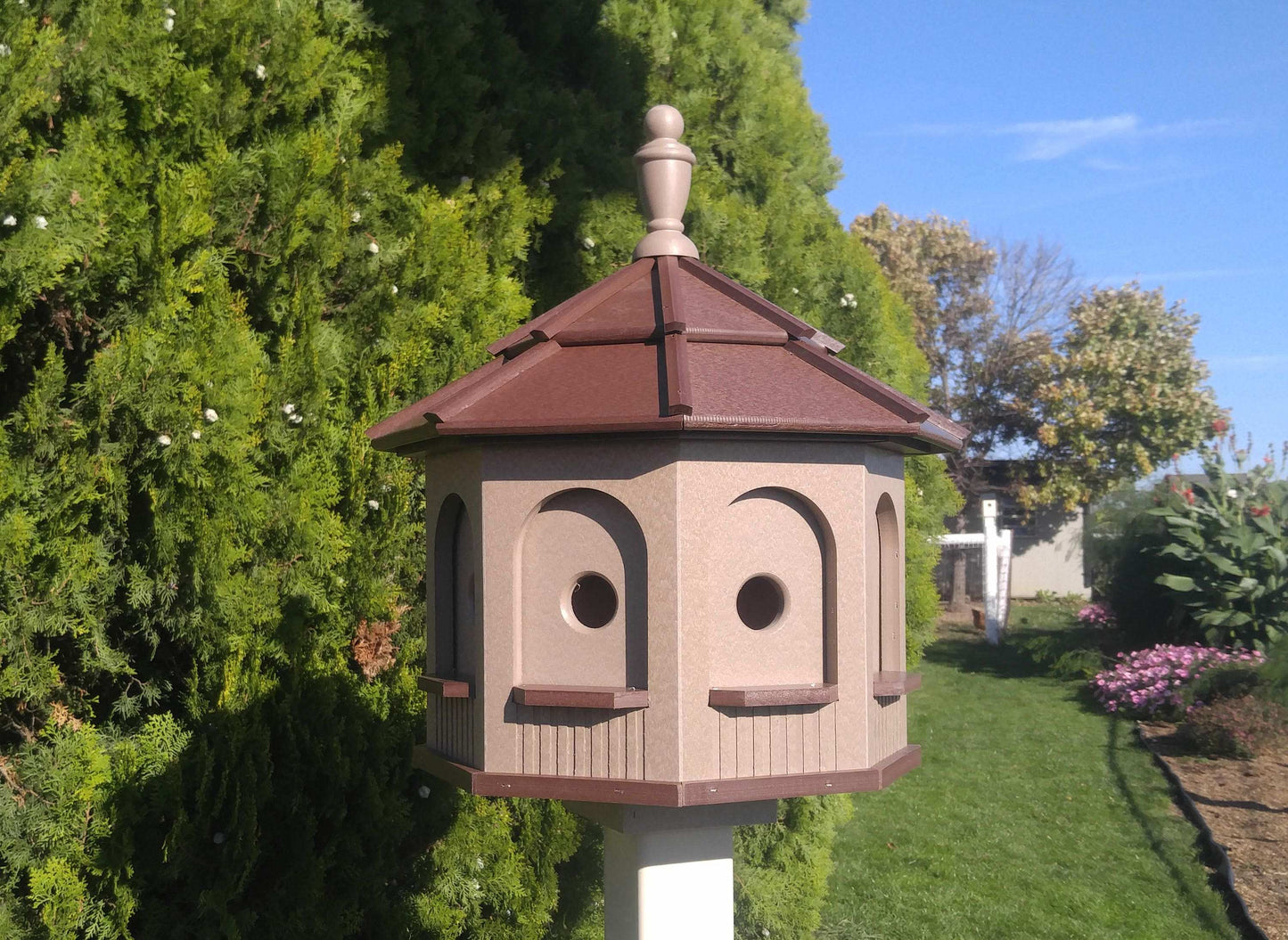 clay and brown poly birdhouse