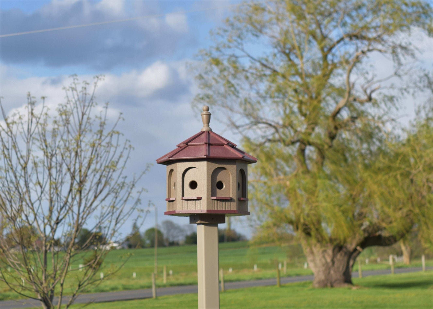 clay and red poly birdhouse
