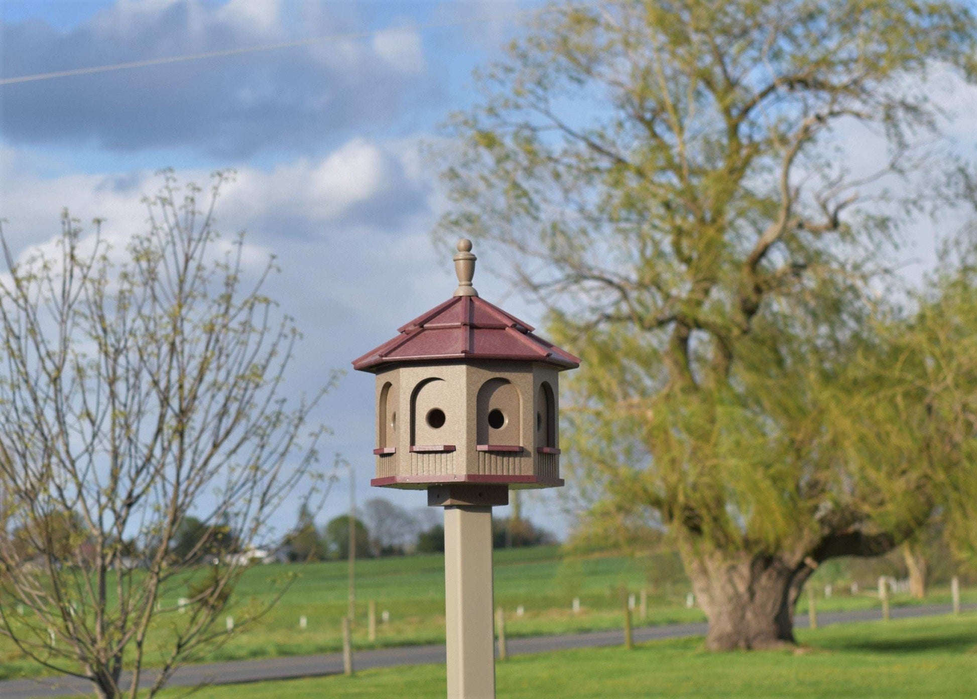 clay and red poly birdhouse