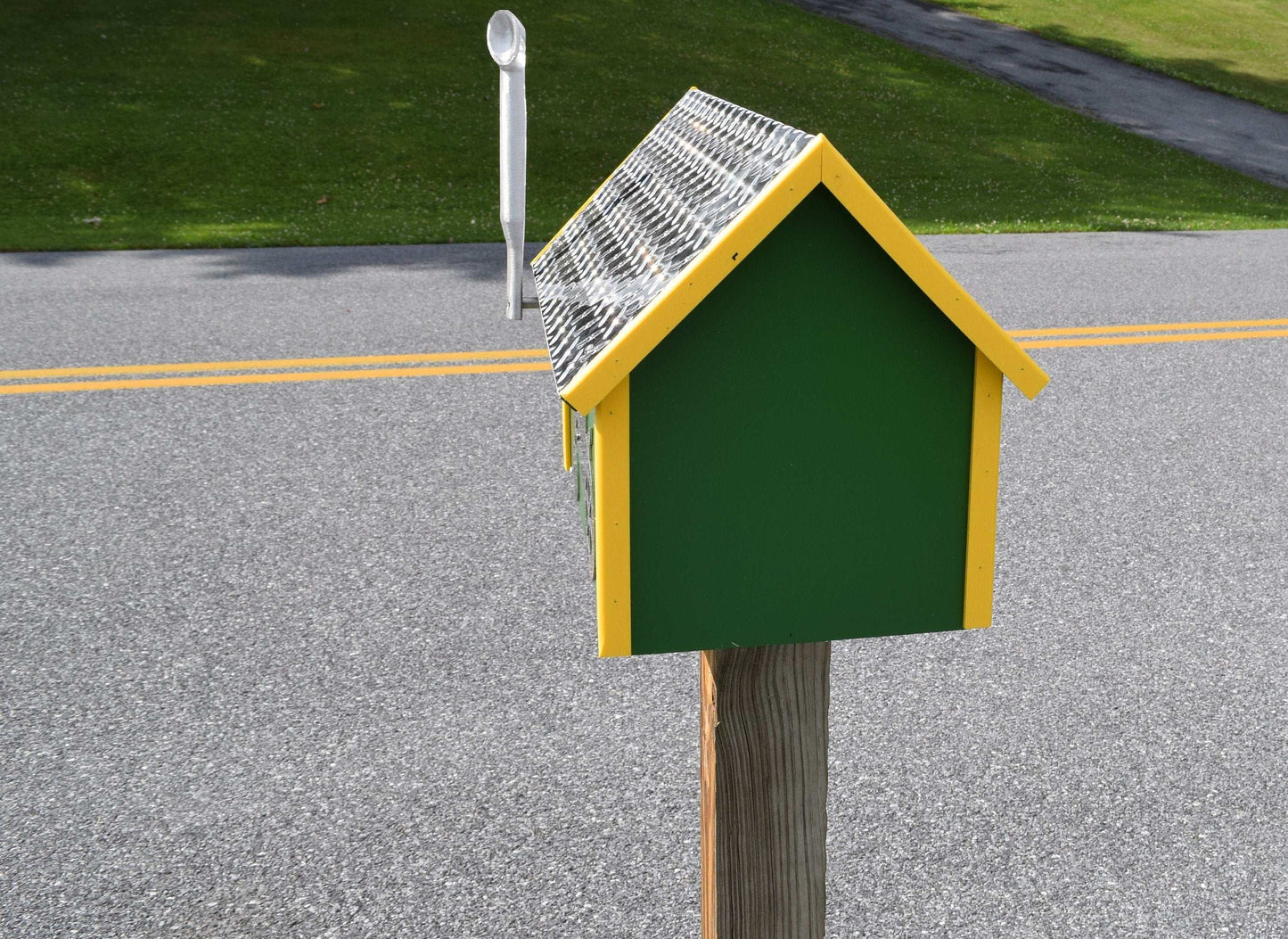 green and yellow farmer mailbox