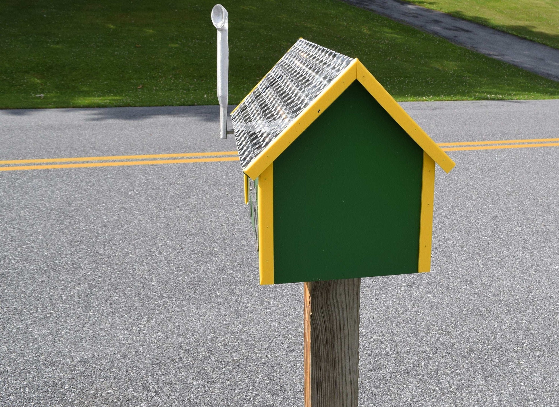 green and yellow farmer mailbox