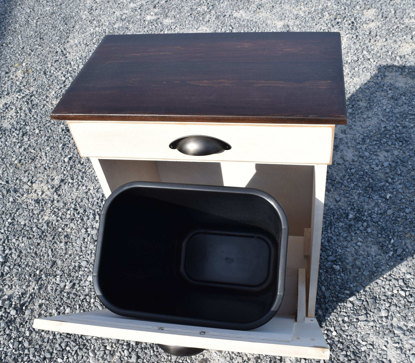 inside view of wooden trash bin