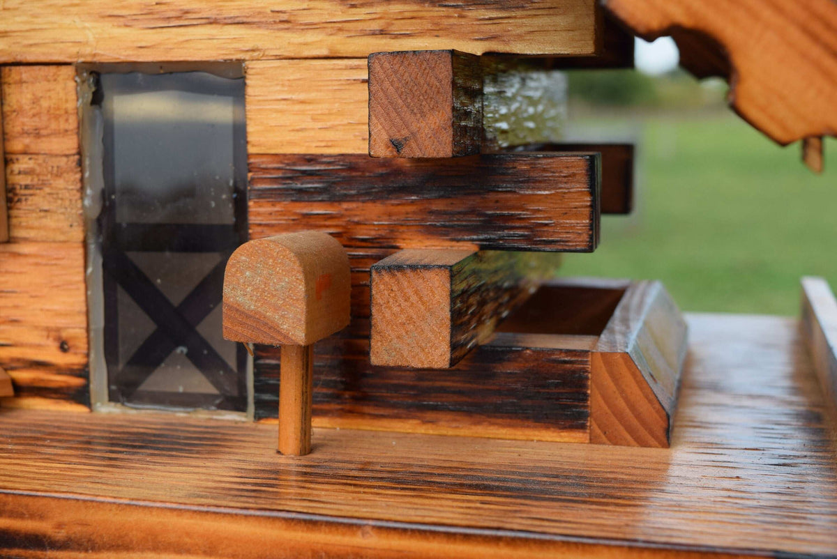 little mailbox on log cabin bird feeder