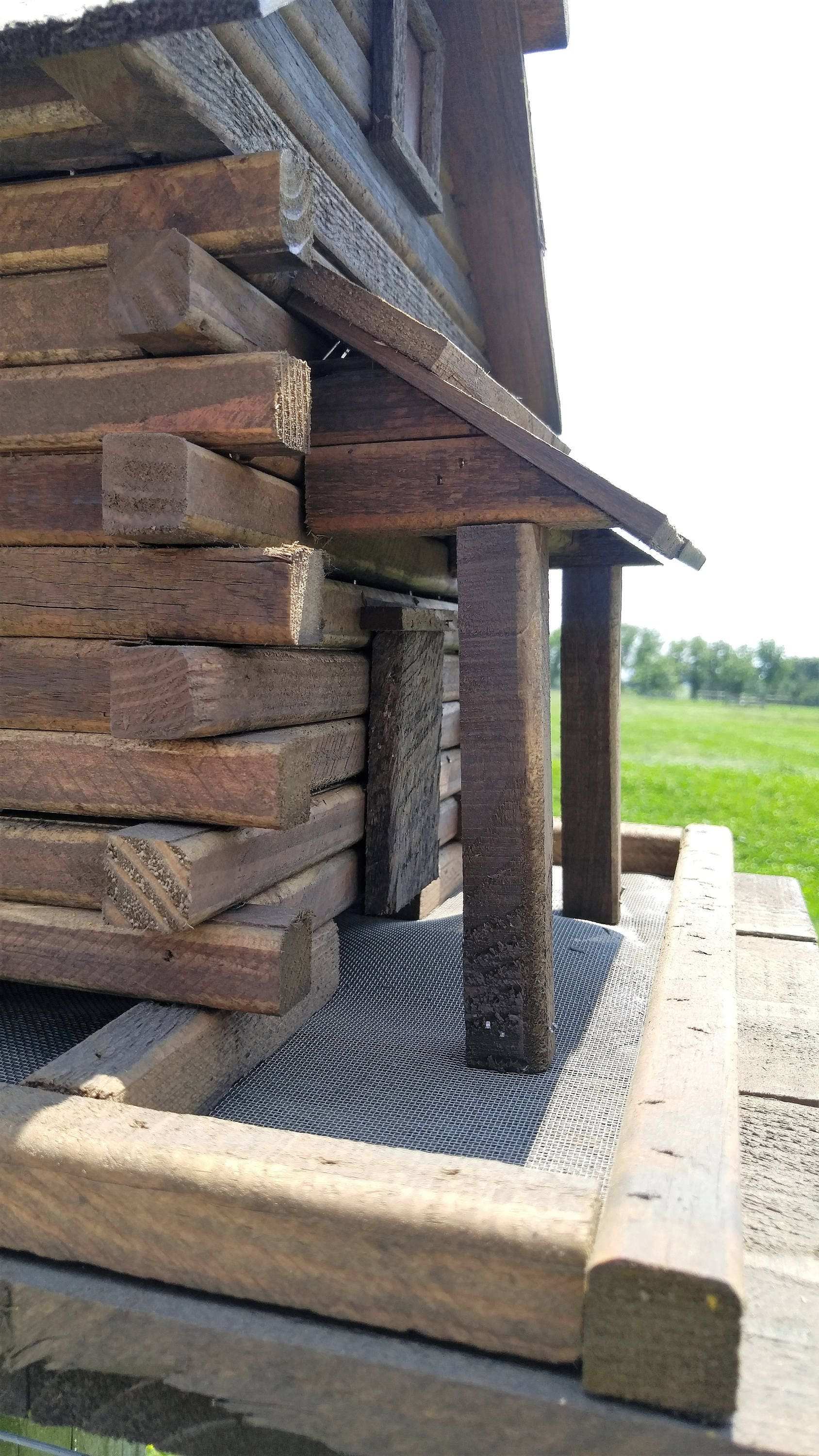 log cabin porch bird feeder