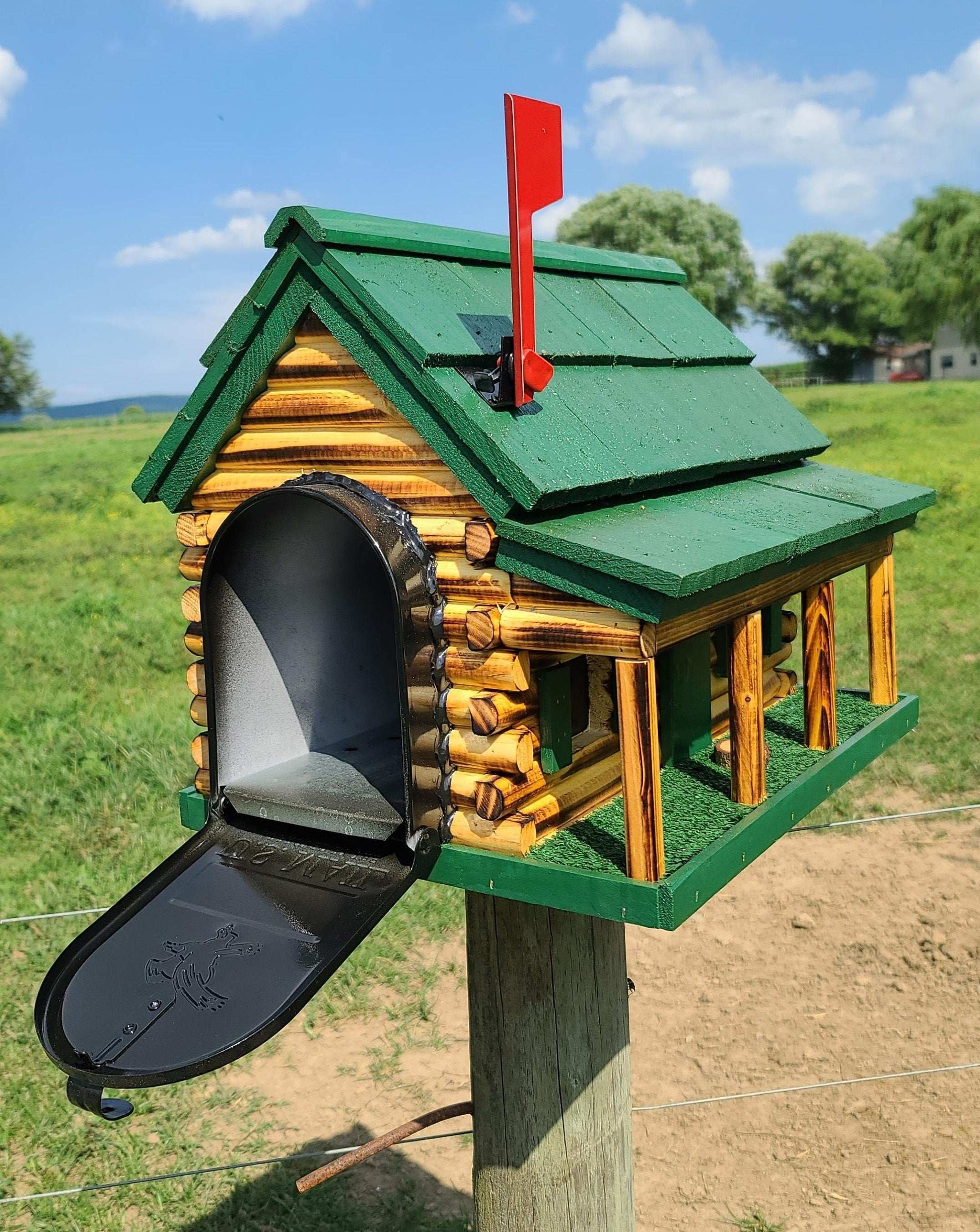 log cabin with porch green
