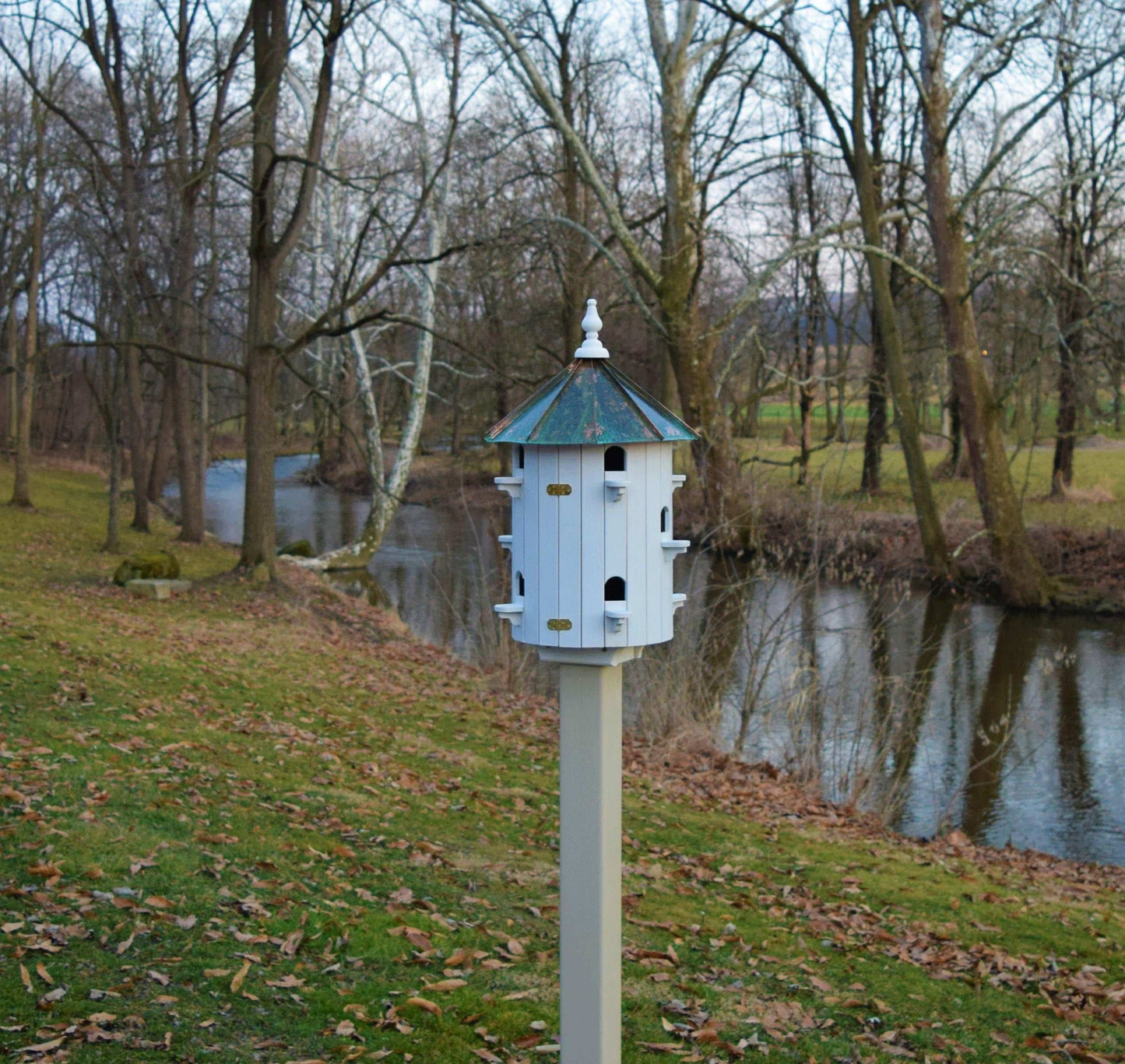 low roof wood and patina birdhouse