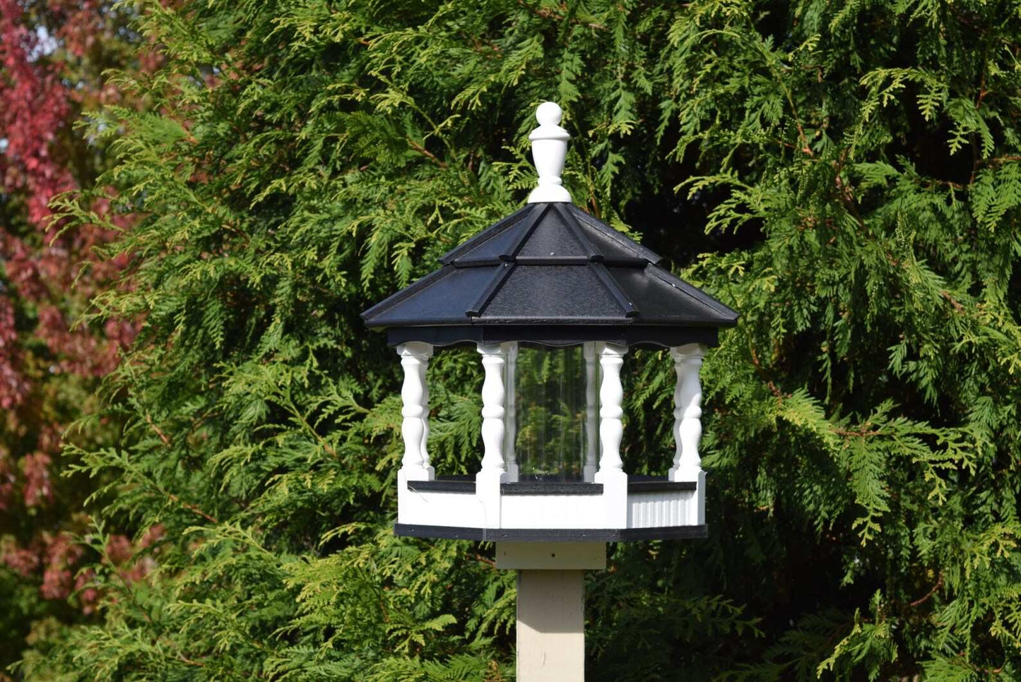 large poly spindle bird feeder white and black