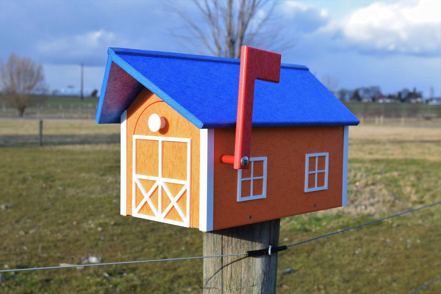 orange white and blue mailbox