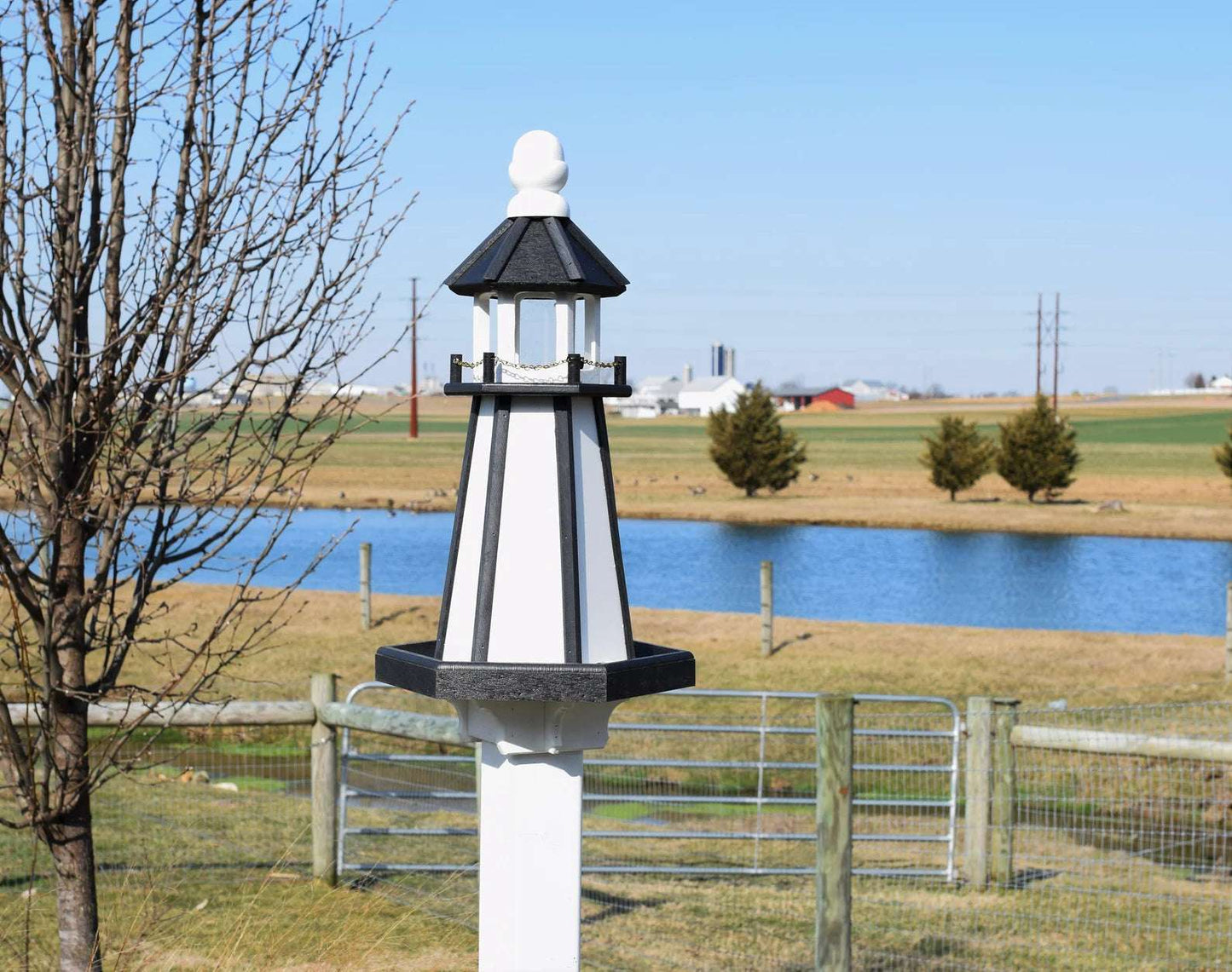 white and black lighthouse poly bird feeder