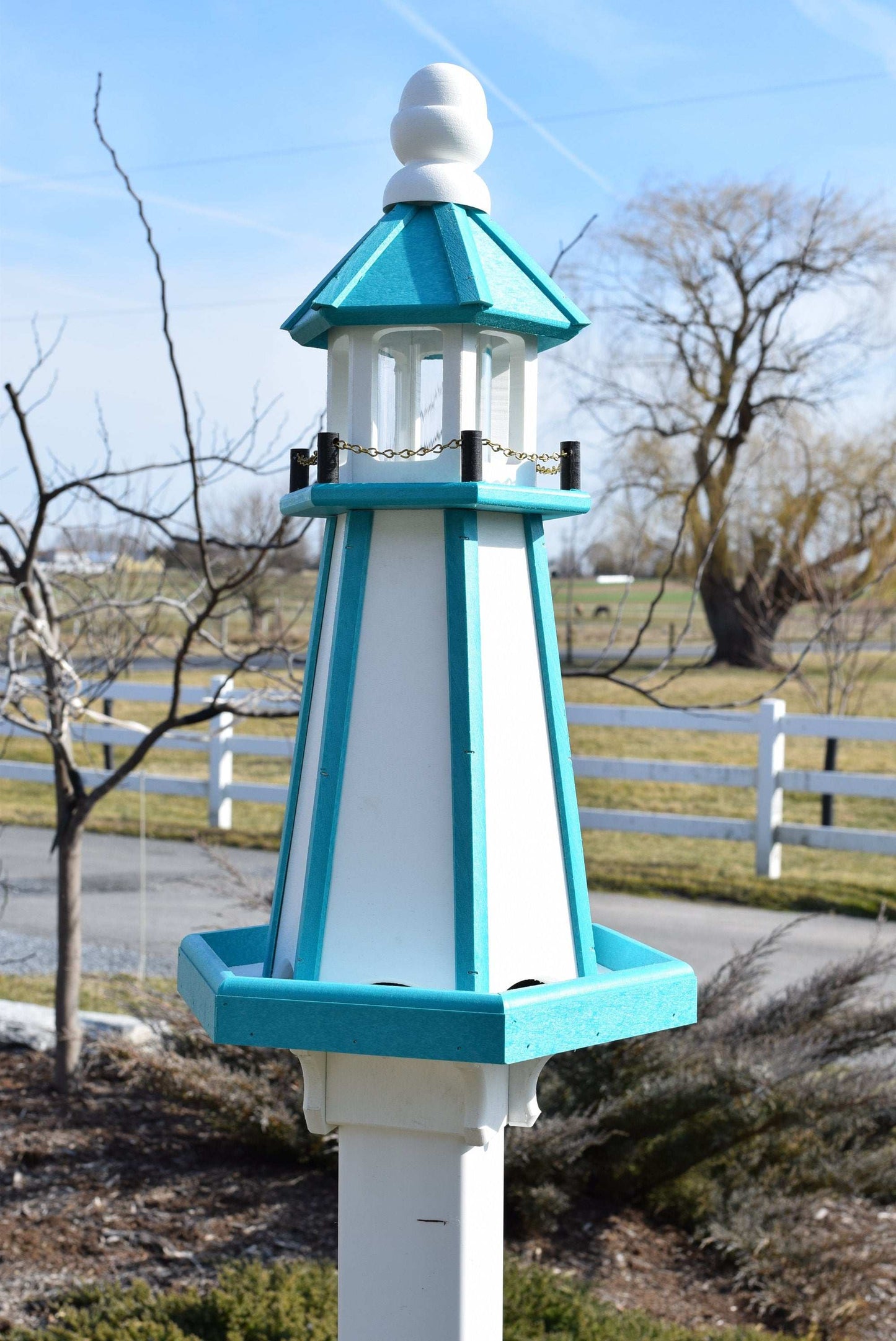 white and teal lighthouse poly bird feeder