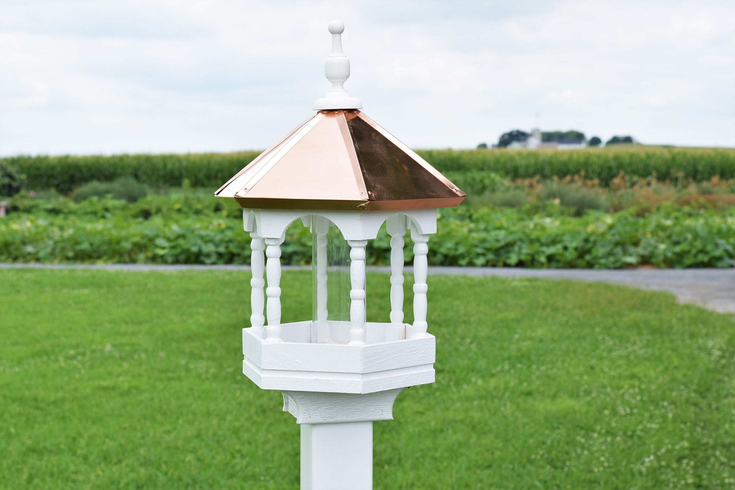 wood and copper spindle bird feeder