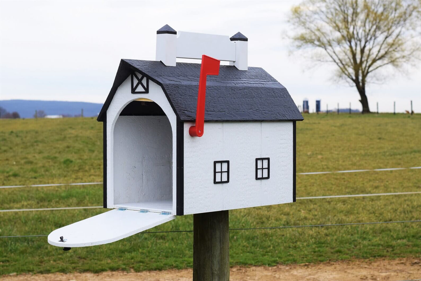 extra large white barn mailbox with nameplate