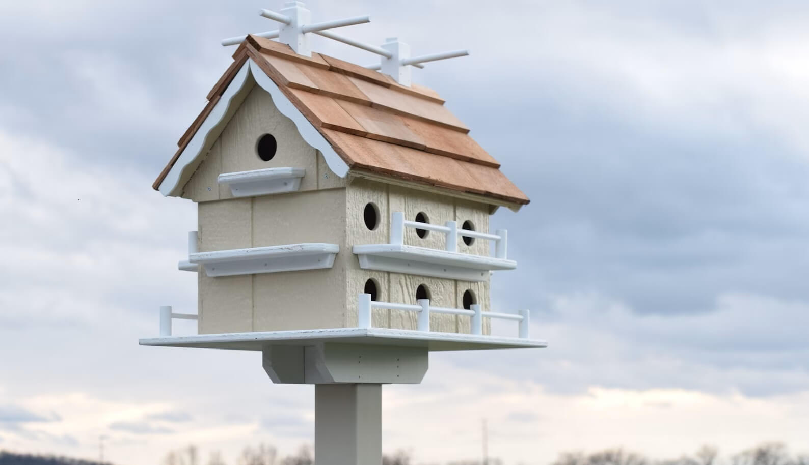 amish handmade large martin birdhouse. wood. beige and white