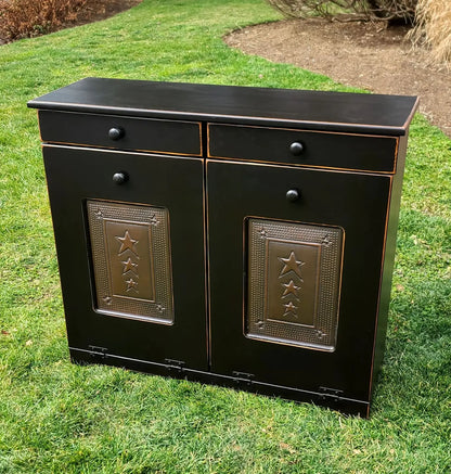Black double trash bin with copper doors