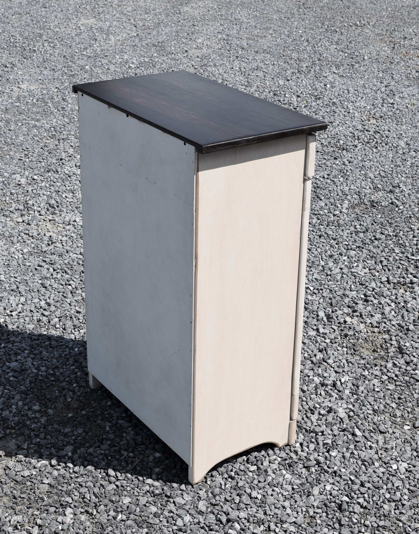 back view of wooden trash bin