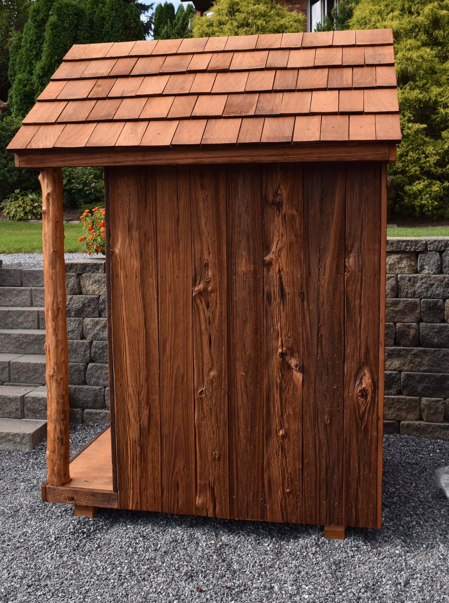 side view of life size wooden tool shed