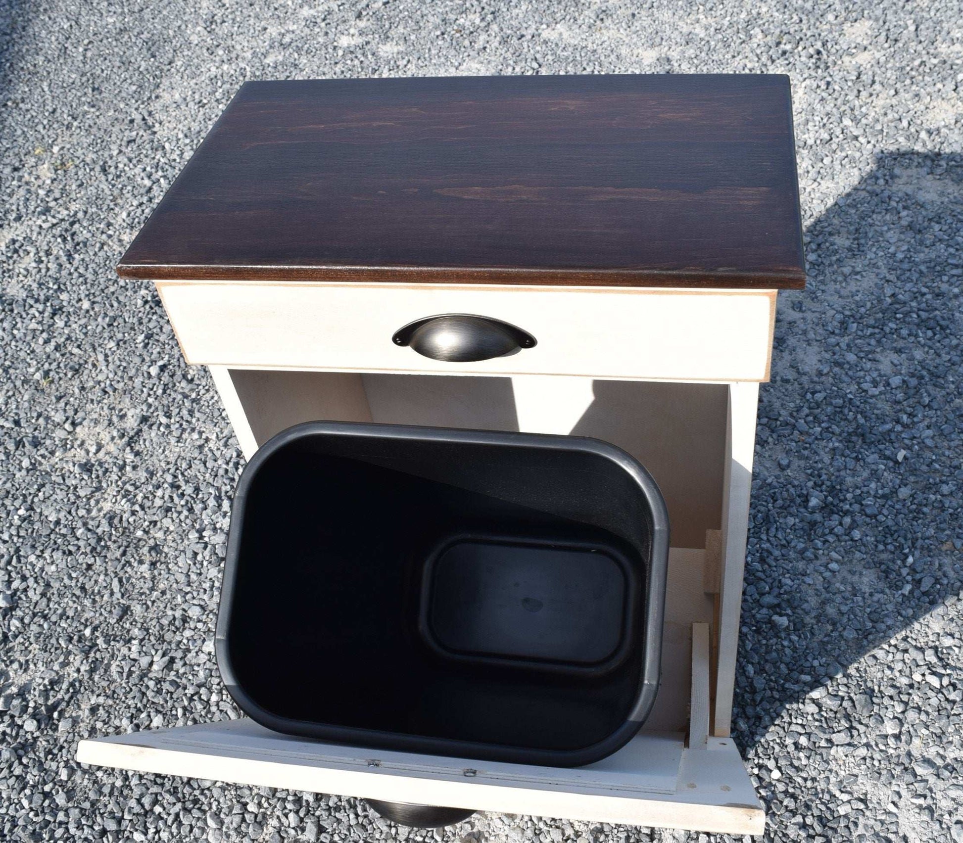 inside view of wooden trash bin 