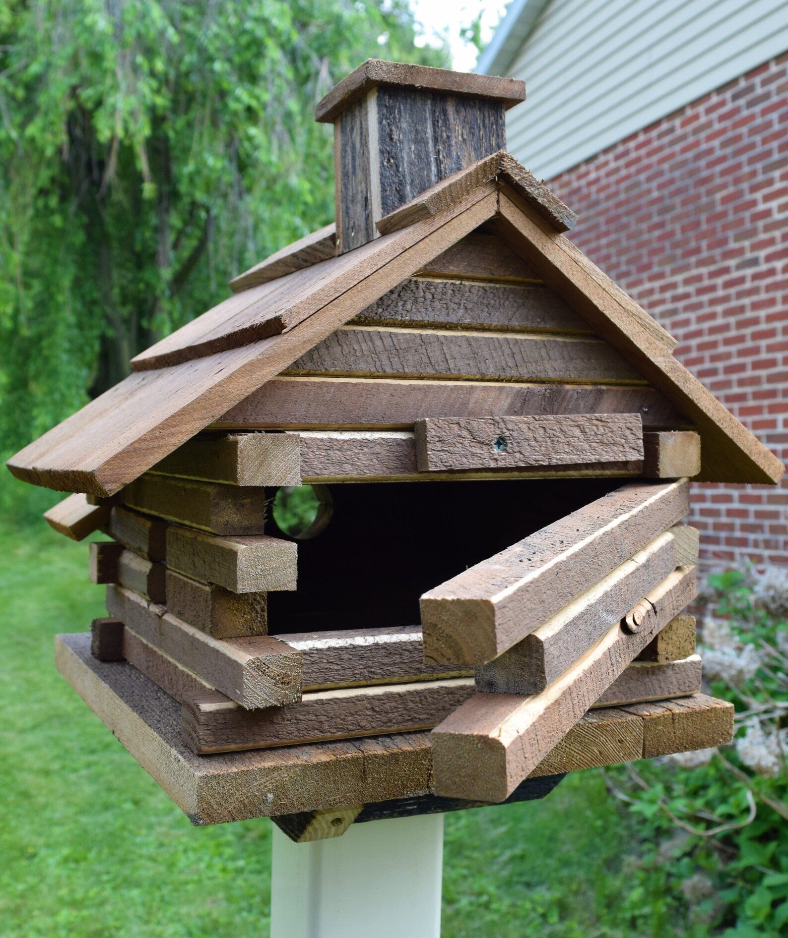 opening of log cabin birdhouse 