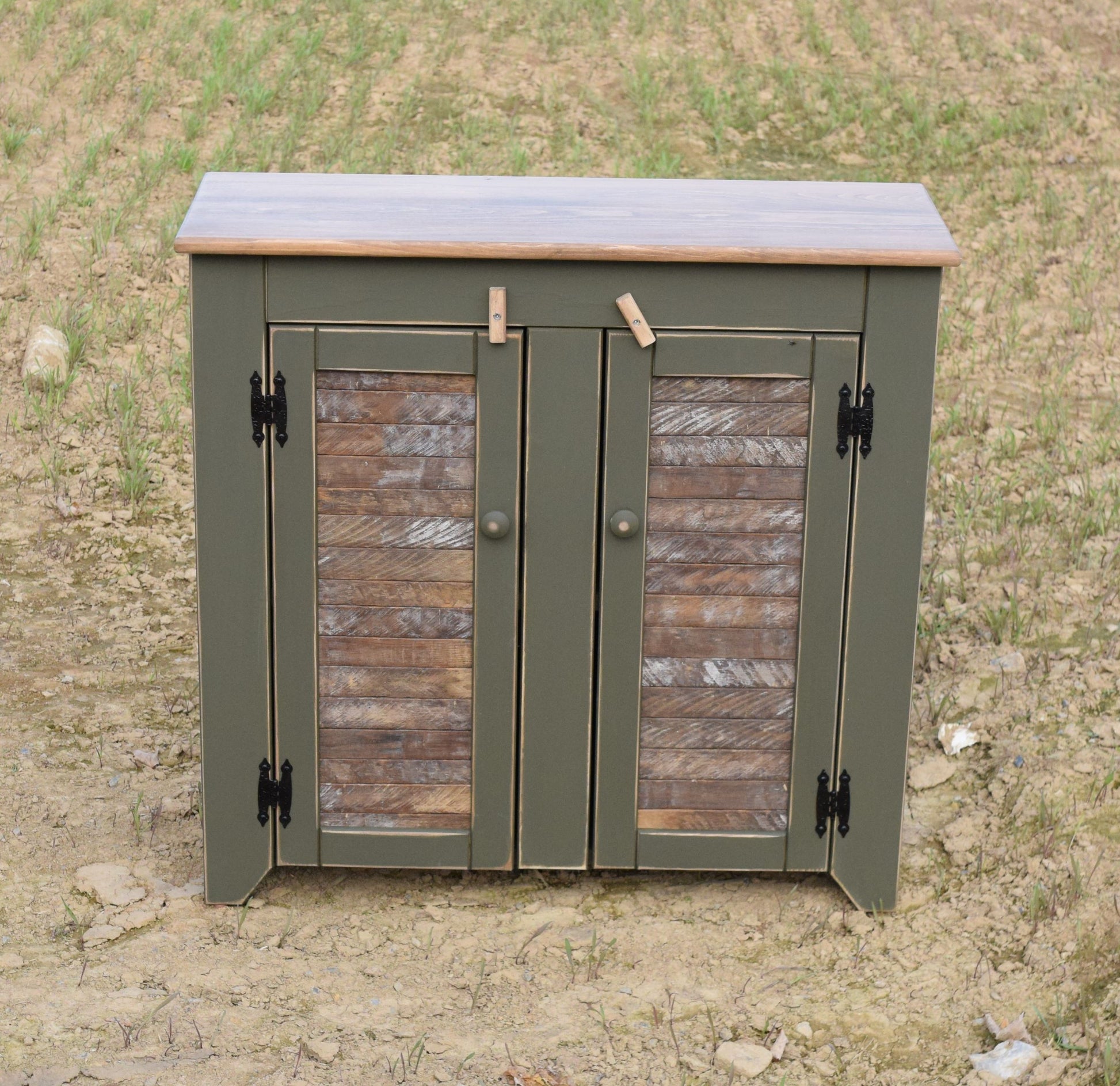 olive green and modern walnut hall cabinet