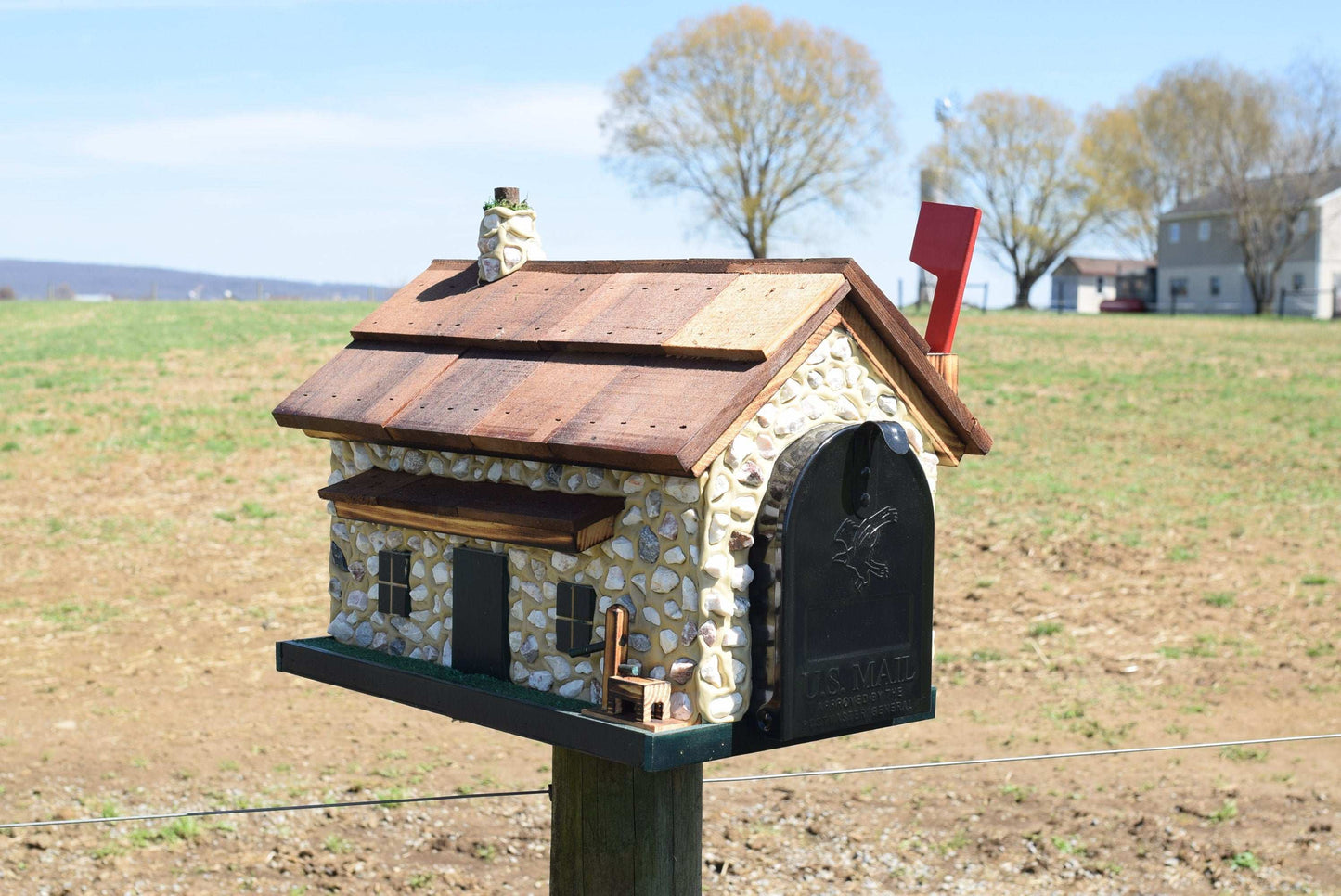 stone house mailbox green trim