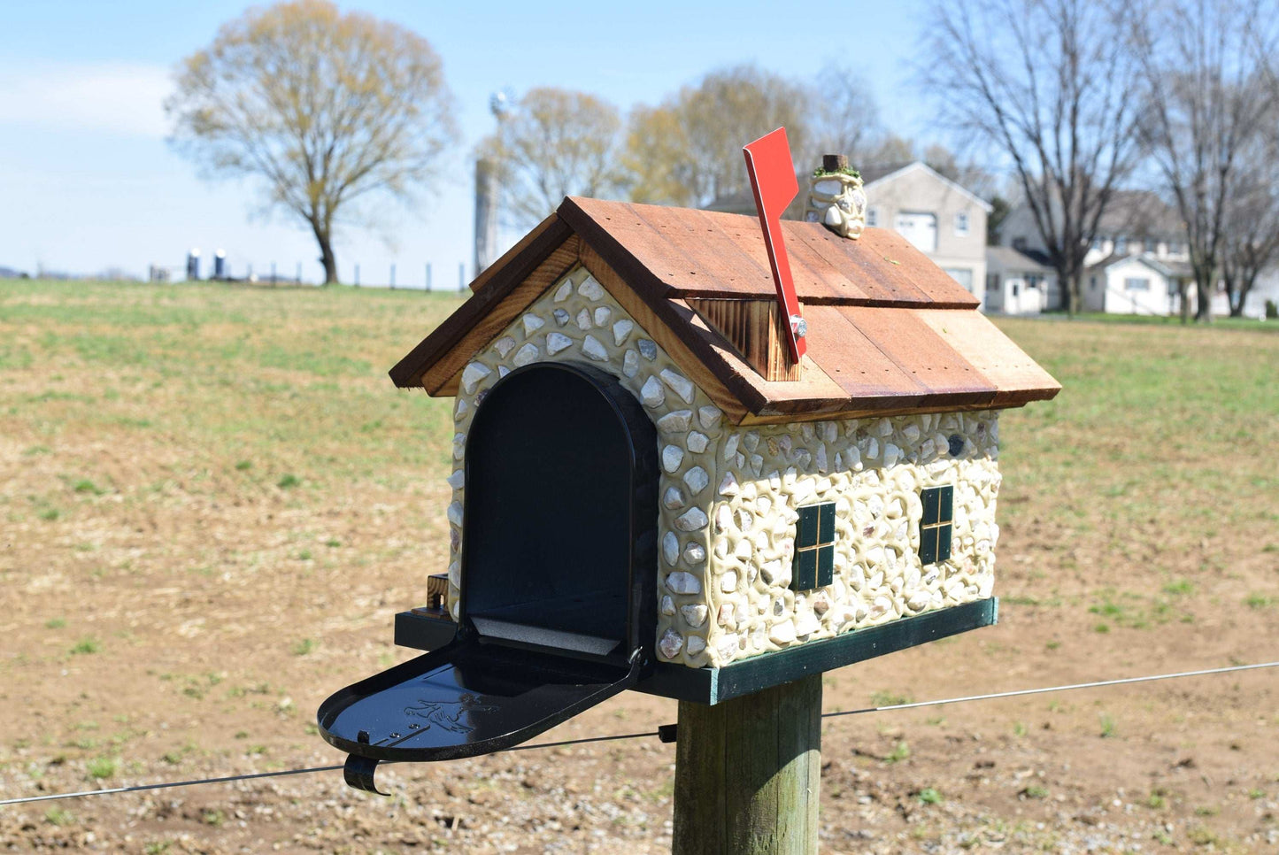 stone house mailbox green trim