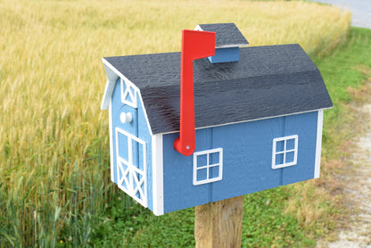 blue barn mailbox with red flag