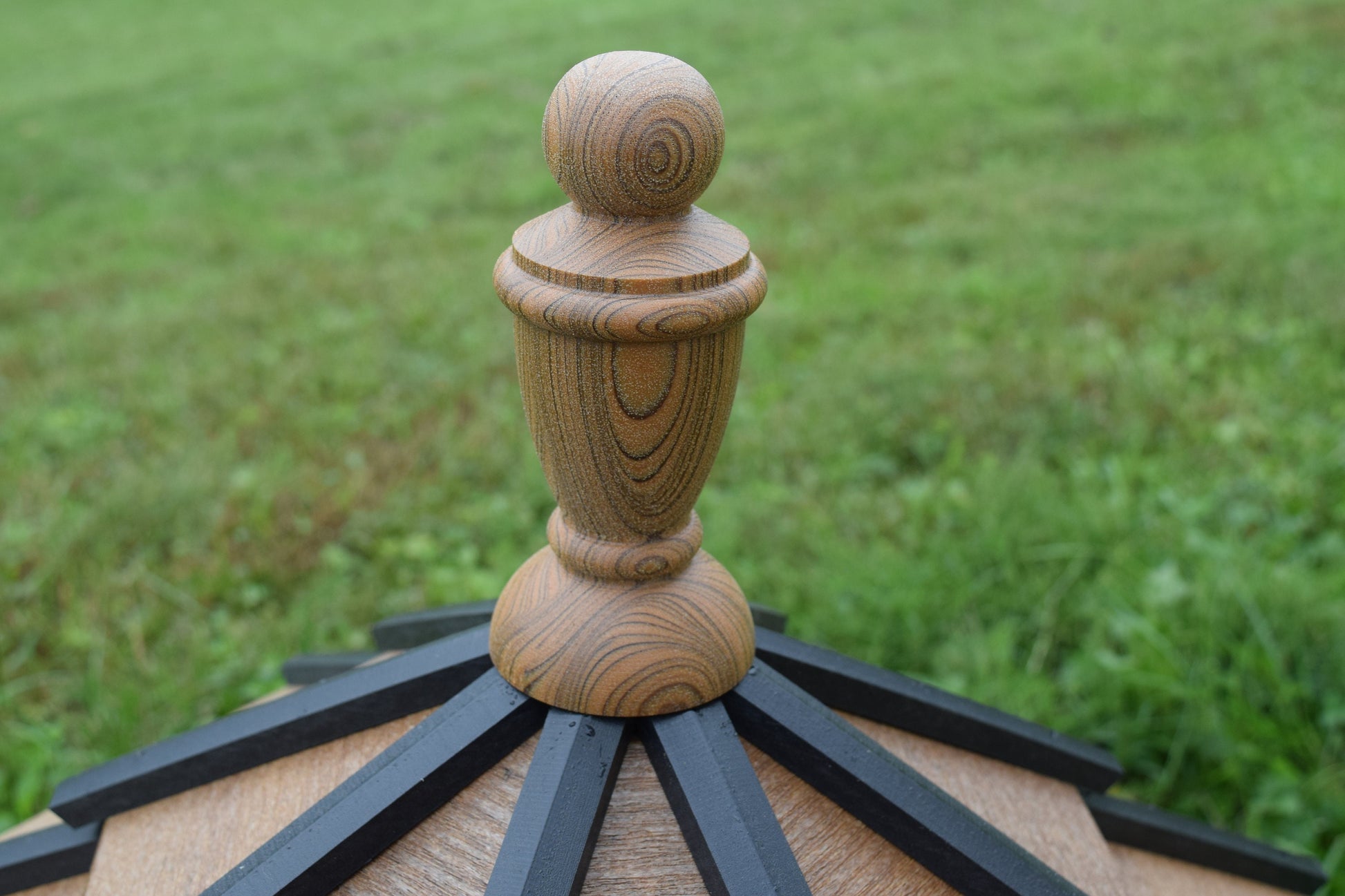 large mahogany finial